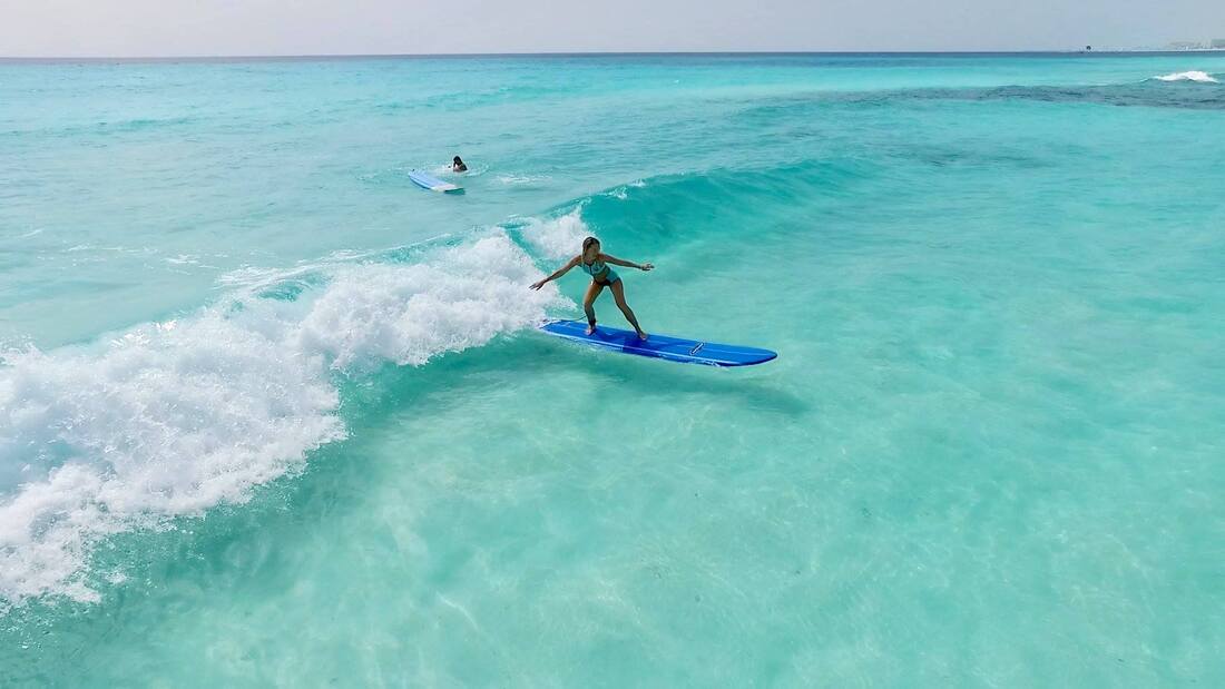 Kate Vostrikova surf lesson in cancun 